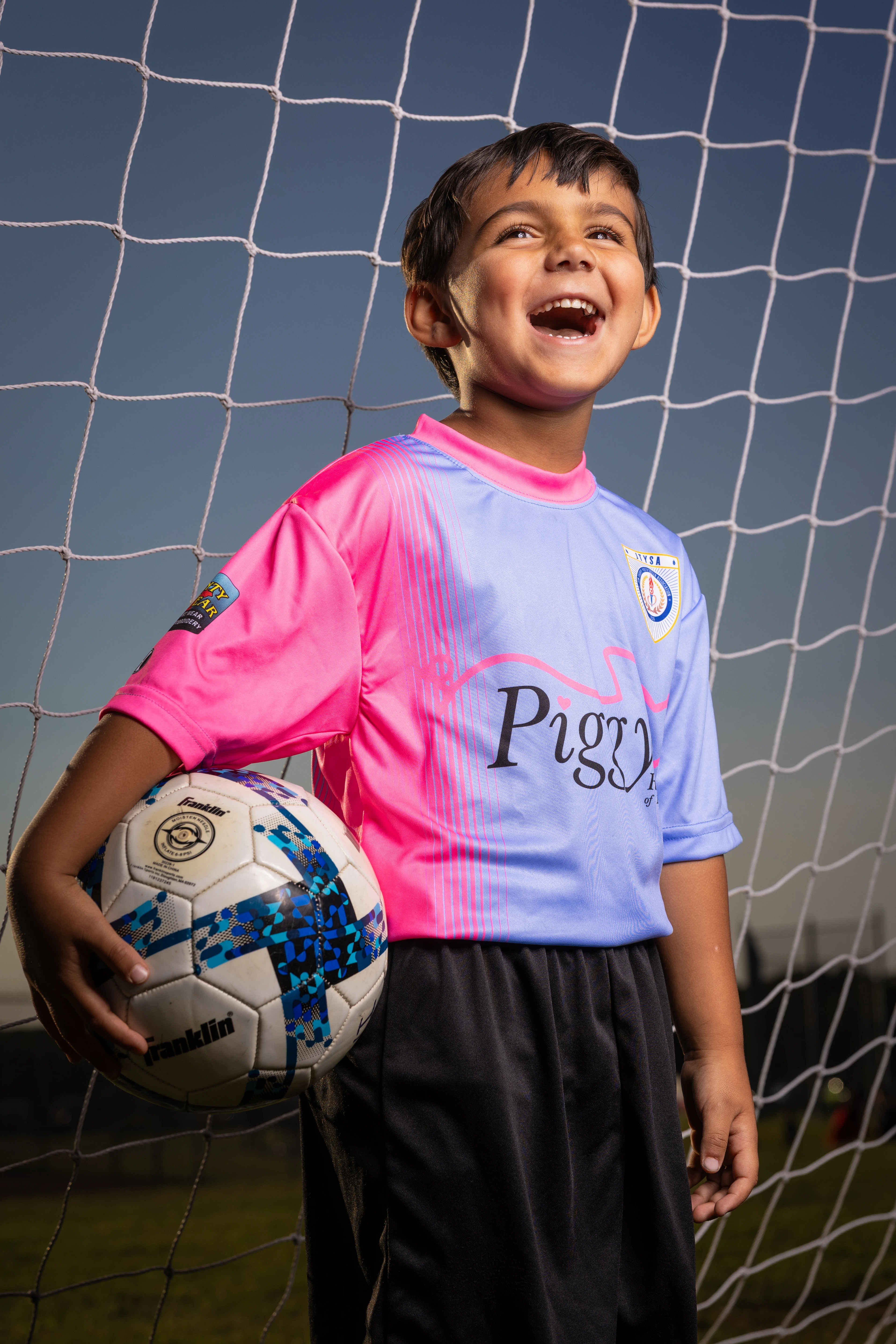 Youth athlete portrait with ball — Sunnyville sports portraits